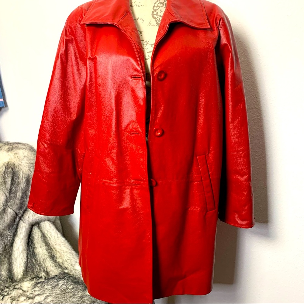 Vintage Red leather knee length coat with three button closure. 80s 90s style